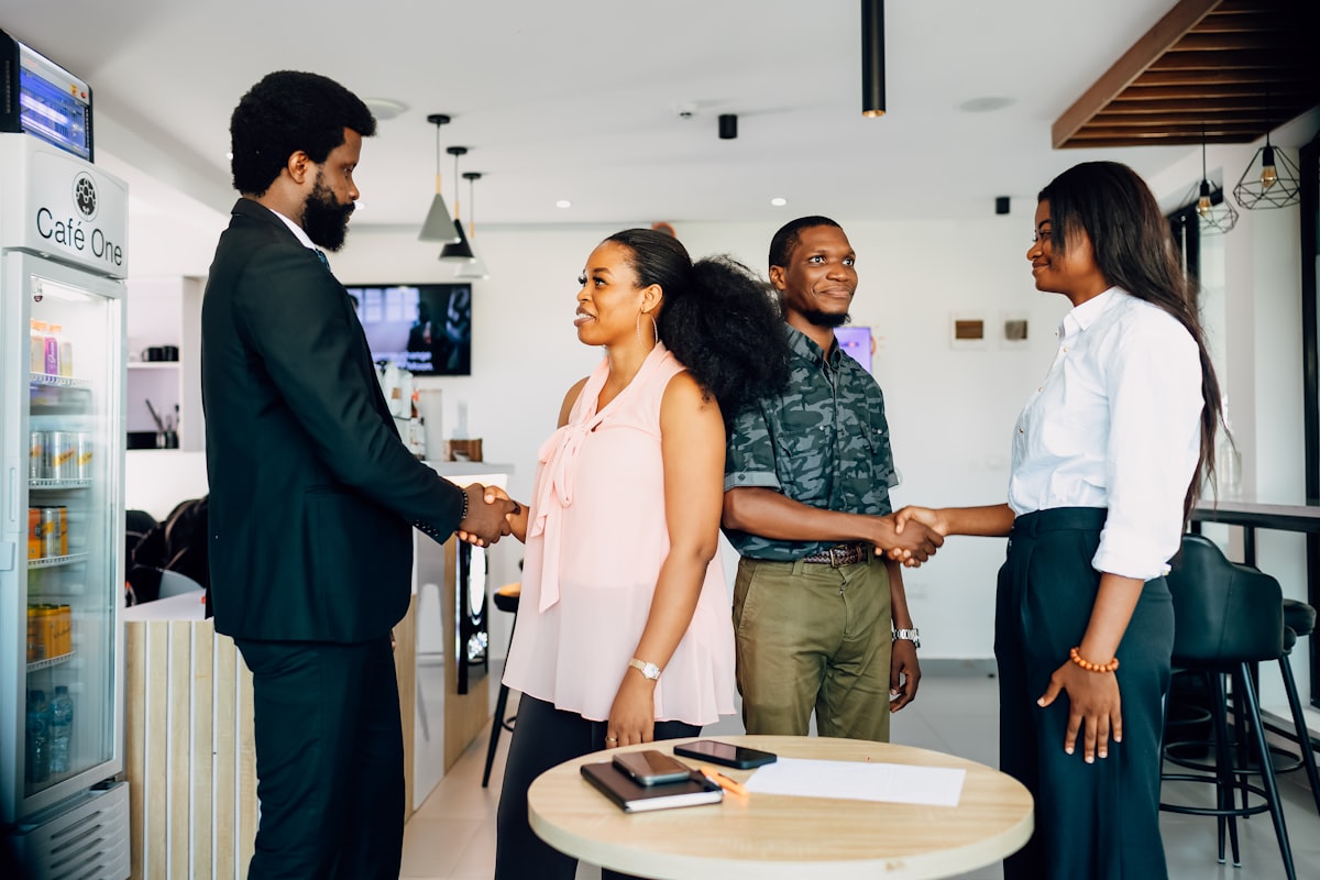 Business partners shaking hands during a meeting